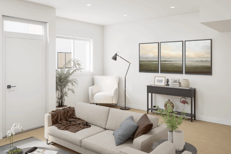 Modern living room in a Kings Crossing townhome in Abbotsford, featuring neutral decor, natural light, and contemporary furnishings.