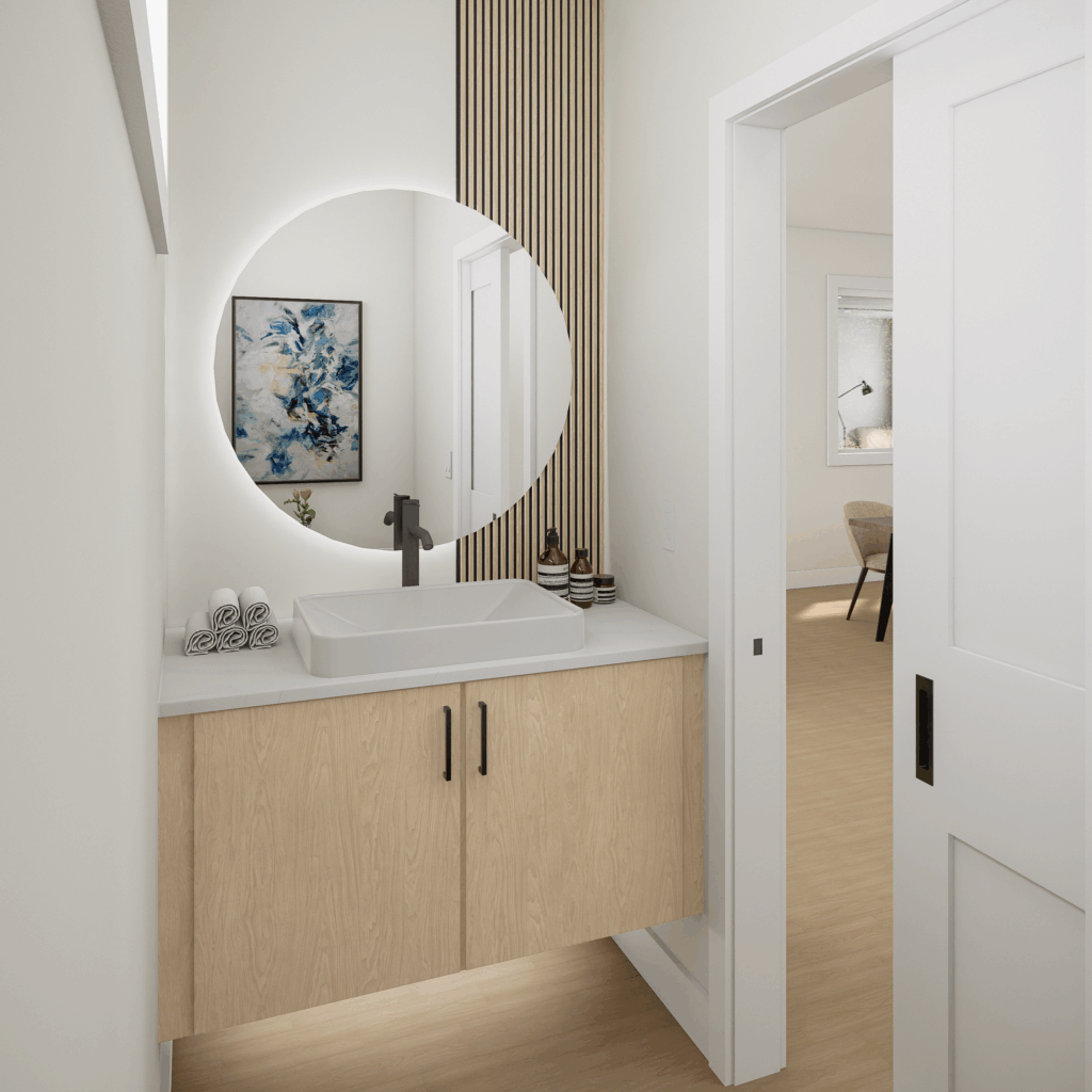 Modern vanity with circular LED mirror, minimalist sink, and natural wood cabinetry in a Kings Crossing townhome, Abbotsford.