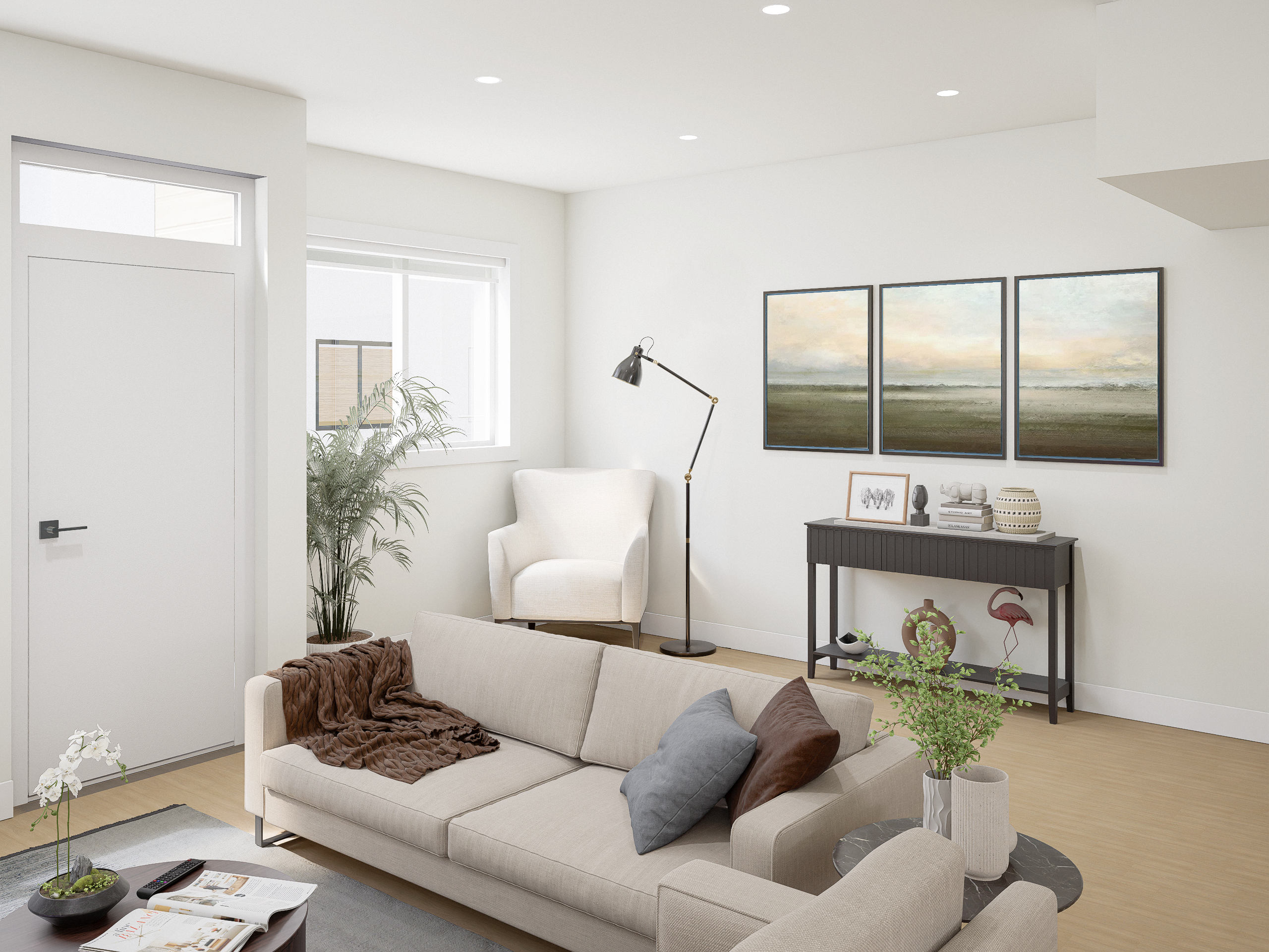 Modern living room in a Kings Crossing townhome in Abbotsford, featuring neutral decor, natural light, and contemporary furnishings.